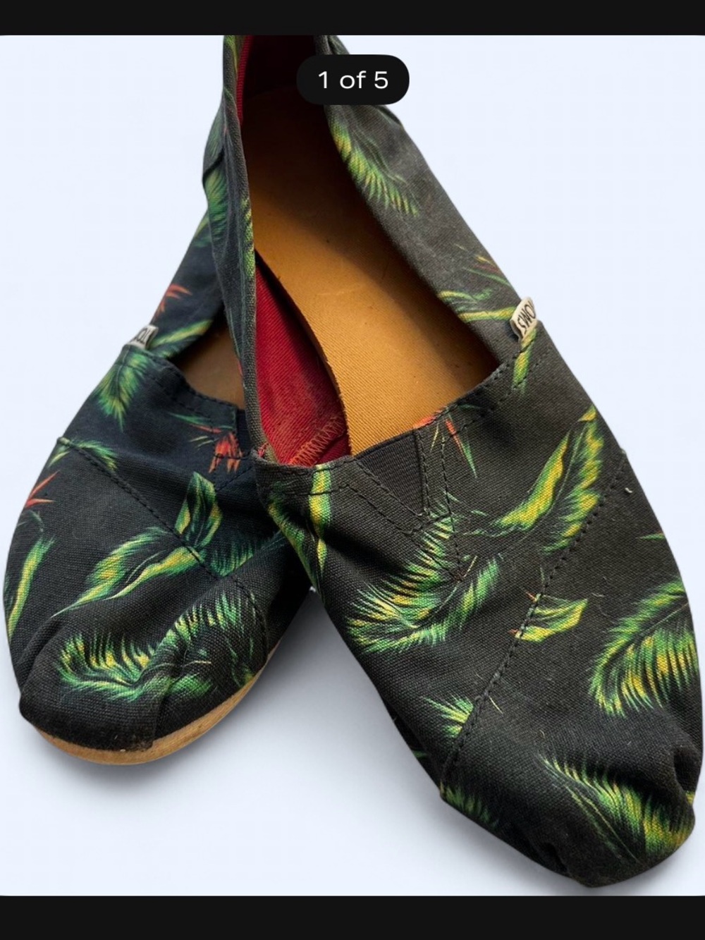 TOMS Black Canvas Slip-Ons with Green Feather Print